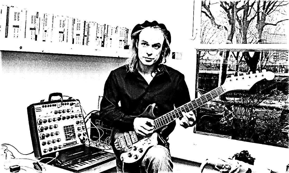 Brian Eno with guitar