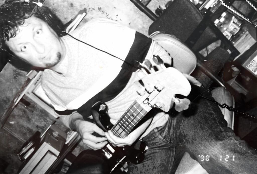 Dave Allen playing bass at the Eighth Dimension Studio in Orlando, Florida - 1998.